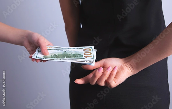 Fototapeta hands money bribe from behind
