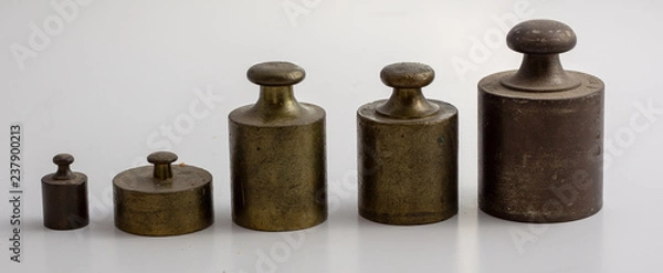 Fototapeta old weights isolated on white background