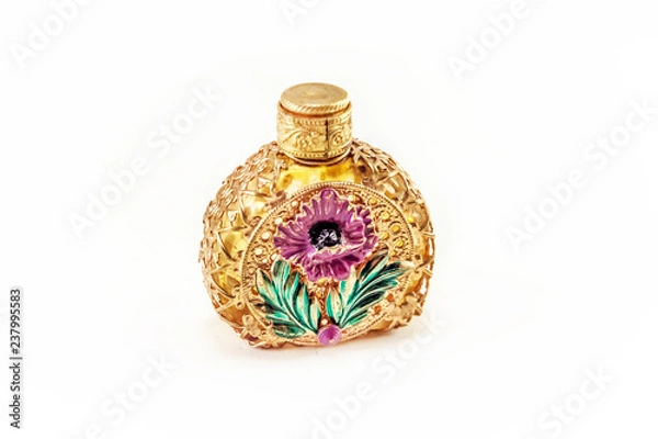 Obraz Vintage perfume bottle in gold filigree isolated on white background
