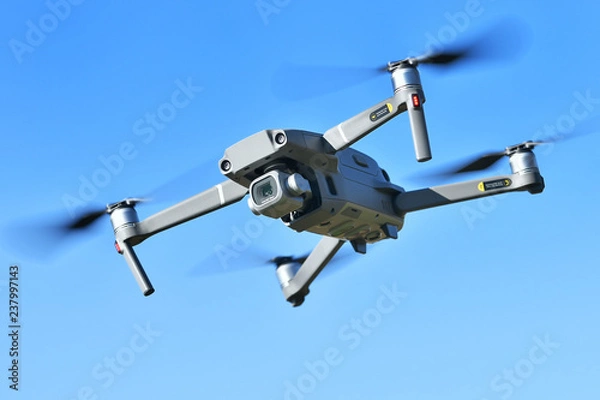 Obraz 飛行中の小型ドローン