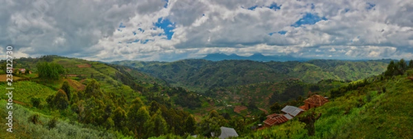 Obraz Panoramic Uganda farmland and buildings with Muhavura Volcano in far distance