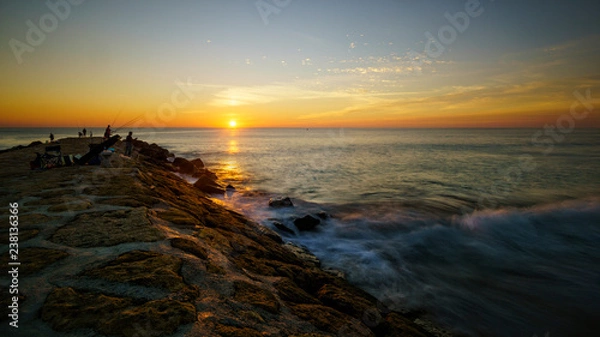 Fototapeta sunset over the sea