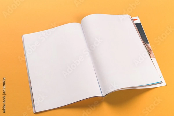 Fototapeta opened magazine mock-up on orange background