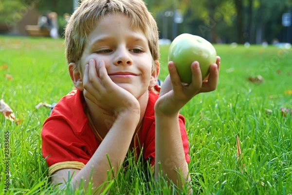Obraz Boy with an green apple