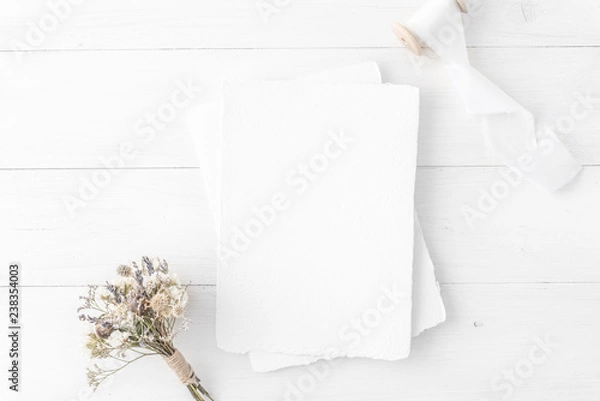 Fototapeta Feminine wedding, birthday desktop mock-up. Invitation card mockup, template Blank greeting cards, rspv card, 5x7, card, envelope. White silk ribbons, dry flowers.  Minimal, clean modern