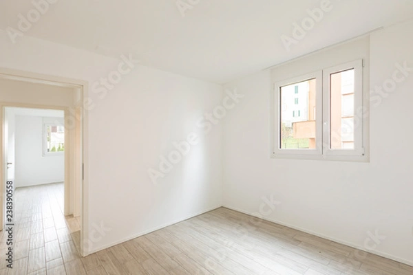 Fototapeta Empty room with white walls, open door and window with a view