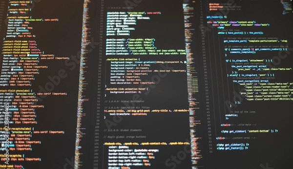 Fototapeta Web developer's computer screen with code