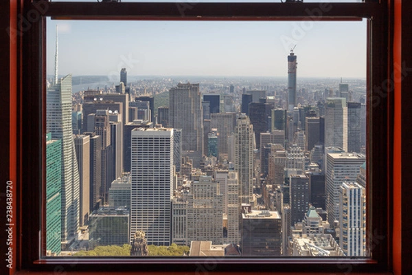 Obraz NEW YORK CITY, NY - AUGUST 09, 2014: View of Manhattan New York City Skyline Buildings from High Rise Window