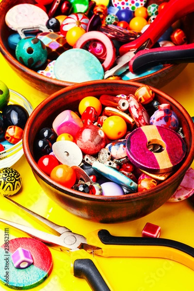 Obraz Beads on yellow background