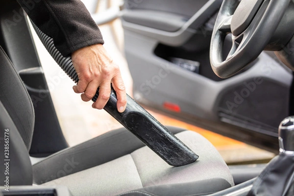 Obraz car cleaning with a sucker