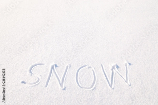 Fototapeta Word snow written in fresh powder snow