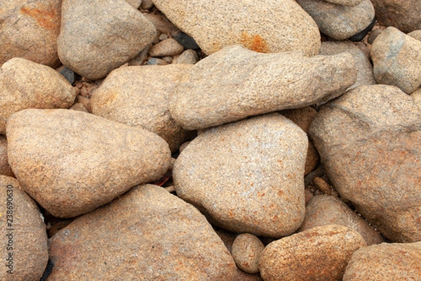 Fototapeta Background image of large red granite cobblestones