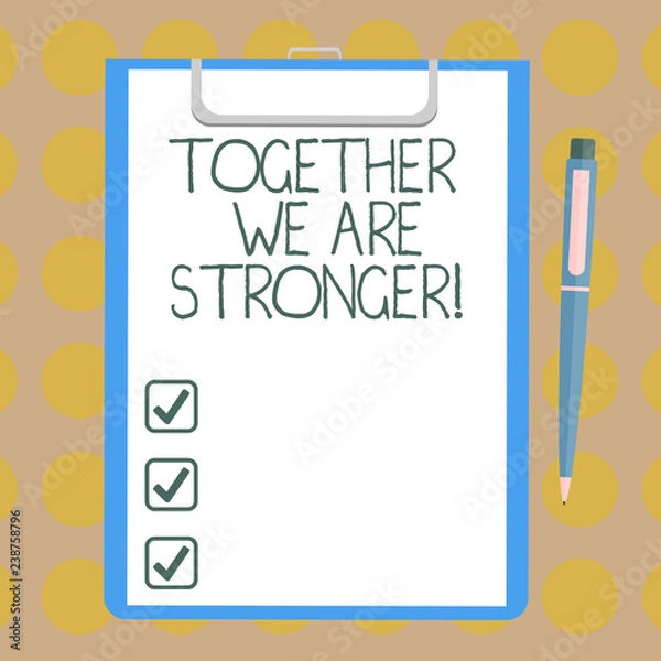 Fototapeta Word writing text Together We Are Stronger. Business concept for Working on a team gives best business results Blank Sheet of Bond Paper on Clipboard with Click Ballpoint Pen Text Space