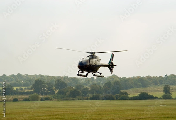 Obraz EC-120 helicopter hovering