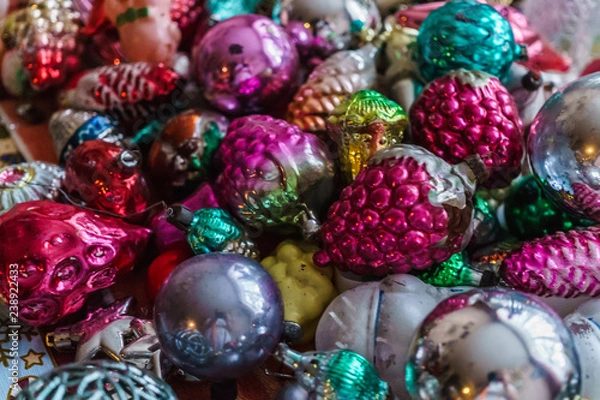 Fototapeta Different colorful Christmas toys ,golden fish, stars, cones. New year.Christmas background