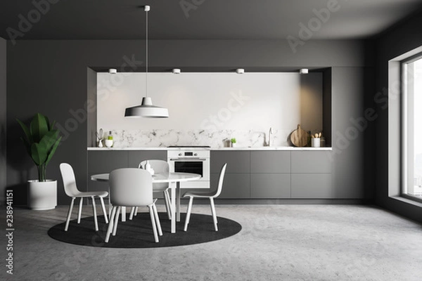 Fototapeta Gray and white kitchen with table