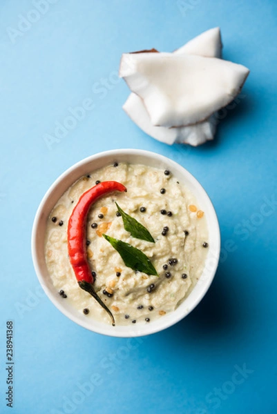 Obraz Nariyal or Coconut Chutney served in a bowl. Isolated over moody background. selective focus