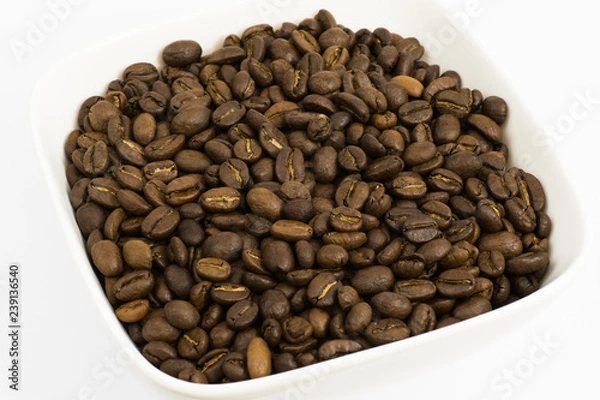 Fototapeta Roasted coffee beans in a white square bowl