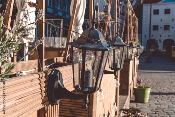 Fototapeta Street Lanterns in The Town Hall Square, the old center of Riga, Latvia. October 25, 2018.