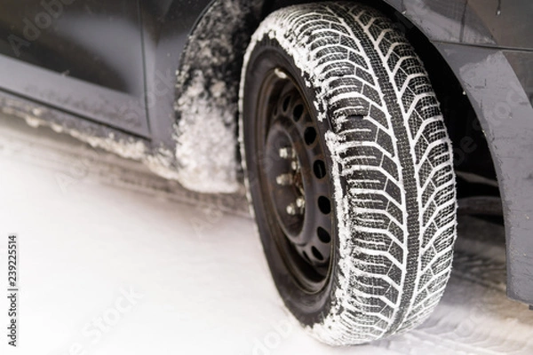 Obraz Winter tires with snow