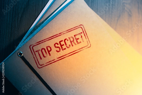 Fototapeta private detective desk with envelopes labeled as top secret