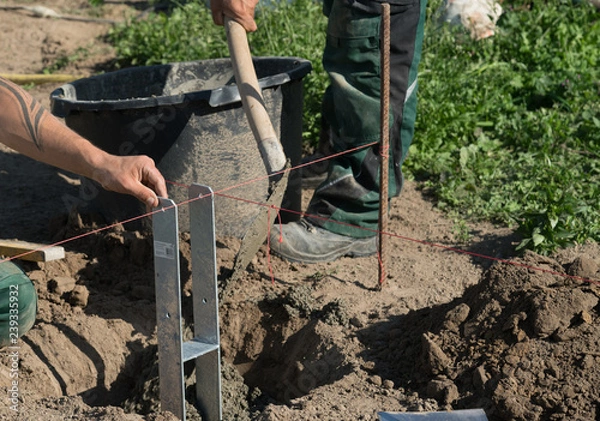 Obraz H Pfostenträger für einen Carport setzen