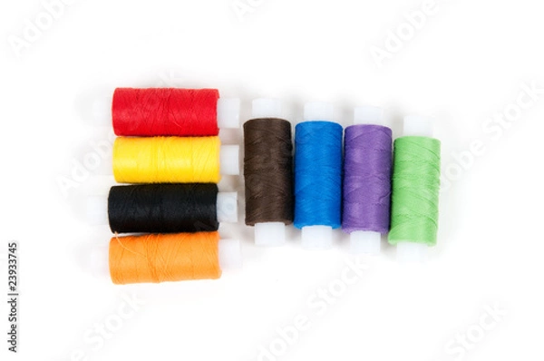 Fototapeta Set of sewing threads on white backgrounds