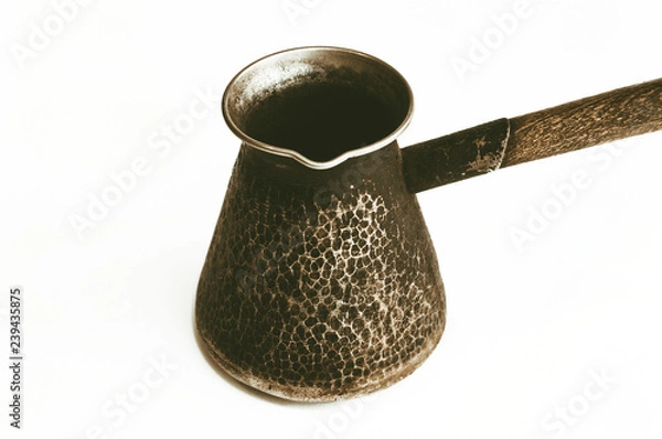 Fototapeta Coffee maker with wooden handle on white background. Close