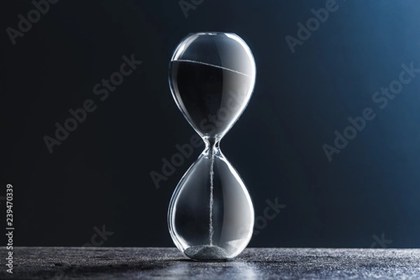 Obraz Hourglass on dark background