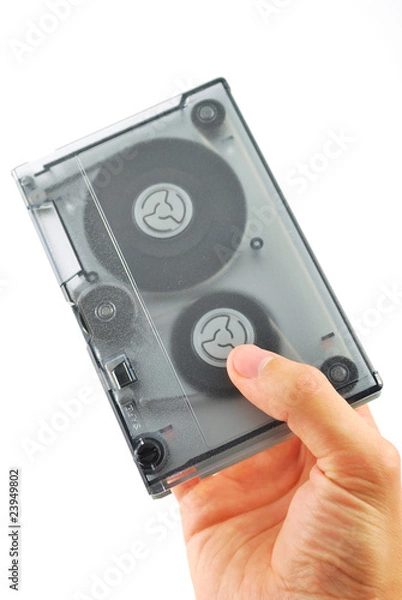 Obraz Magnetic backup computer tape given on white background.