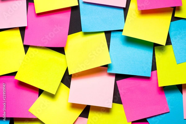 Fototapeta Many colorful sticky notes on black background
