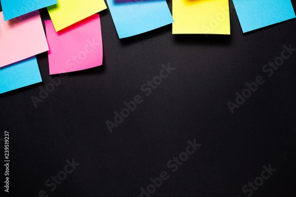Fototapeta Many colorful sticky notes on black background