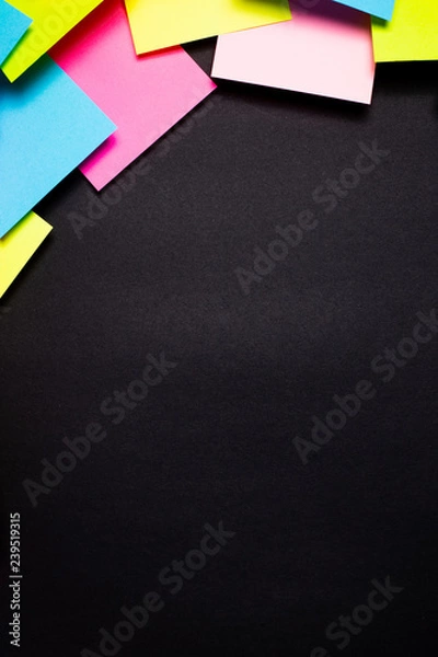 Fototapeta Many colorful sticky notes on black background