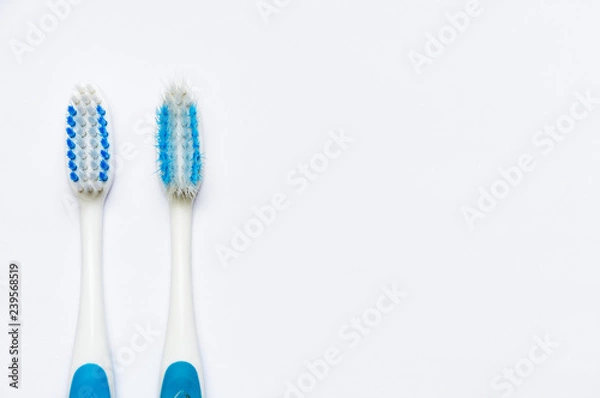 Obraz toothbrush replacement, old and new toothbrush isolated on white background, copy space