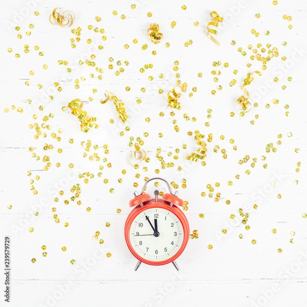 Fototapeta New Year composition alarm clock golden confetti