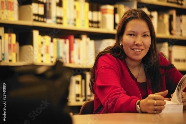Obraz Student w bibliotece