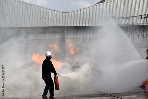 Fototapeta Gas pipeline leaks at the joints with the valve. Spark and Fire on the gas pipeline. An explosion at the gas pipeline.