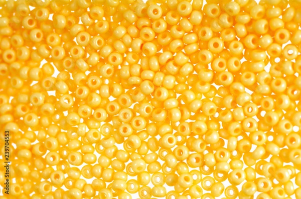 Fototapeta Flame-orange glass beads background - closeup beads texture