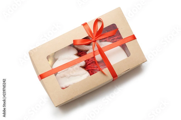 Fototapeta Christmas gingerbread cookies in a box isolated on white background