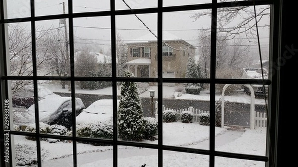 Fototapeta Snow through window