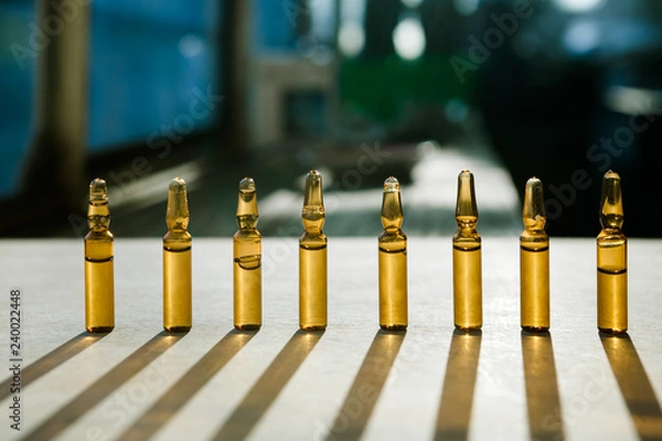 Fototapeta Group object of liquid medicinal agent in limpid glassware in medical laboratory.