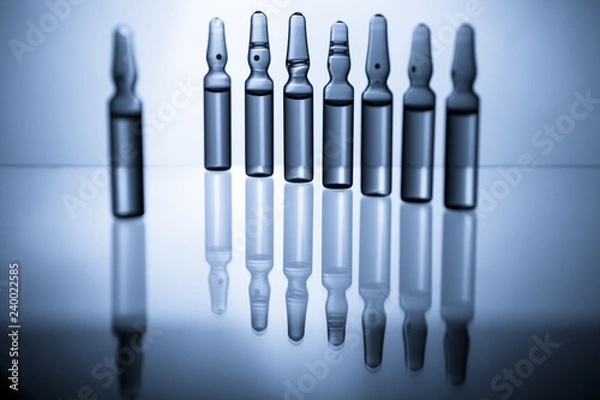 Fototapeta Group object of liquid medicinal agent in limpid glassware in medical laboratory.