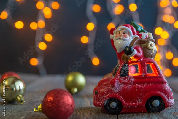 Obraz Toy Santa Claus by car