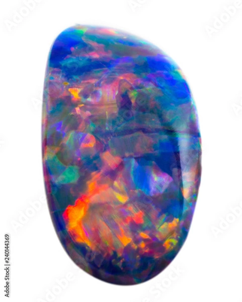 Fototapeta Polished natural colorful blue iridescent opal on white background isolated