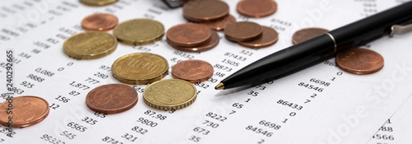 Obraz Financial accounting, Image a plurality of numbers on paper and calculator, Numbers on paper, a pen and a calculator, coins.