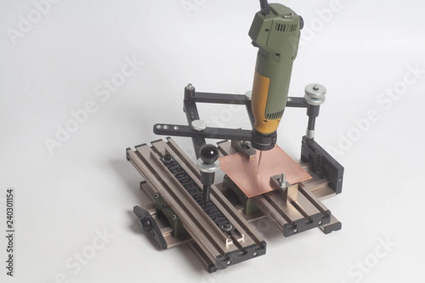 Fototapeta Engraving device pantograph with CNC engraver with letterpress alphabet