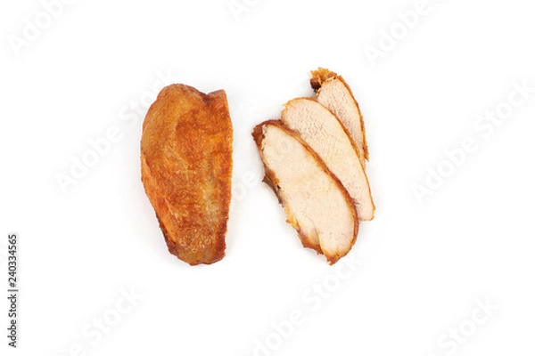 Obraz A close up of grilled, sliced chicken breast isolated on white background .