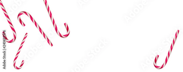 Fototapeta Candy canes on white background with copy space