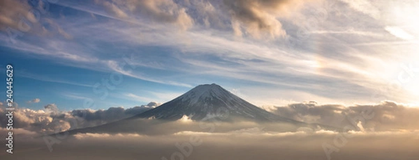 Fototapeta Mountain Fuji in sea of mist or fog at sunrise with cloudy sky, Fujikawaguchiko, Yamanashi, Japan.
