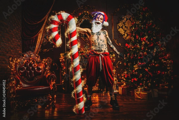 Obraz big man with big christmas candy